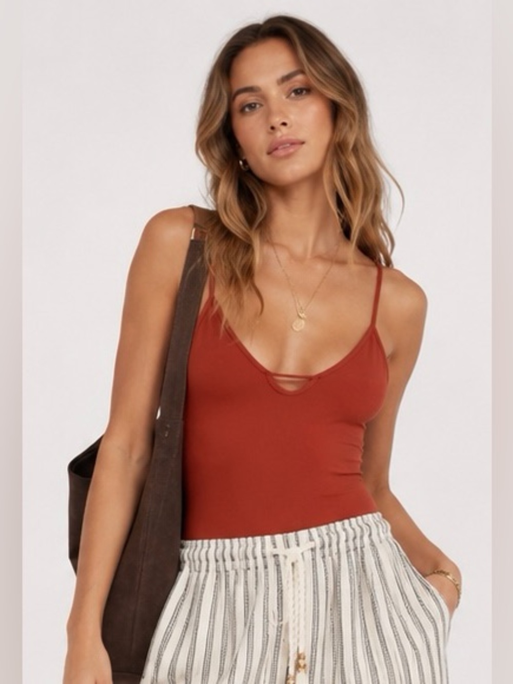 Free People NWOT Move Along Bodysuit in Terracotta